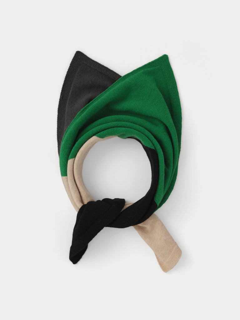 grey green cream and black square scarf tied in a knot