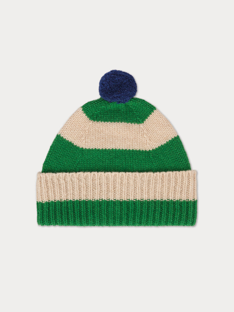 green and cream striped beanie with blue pompom