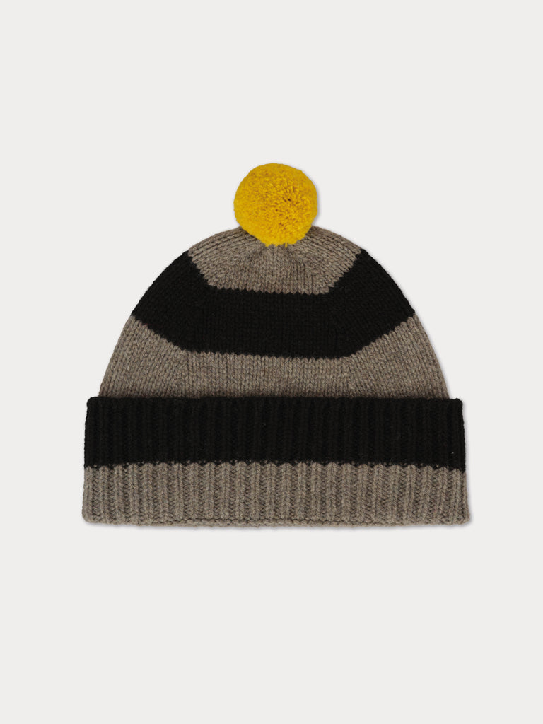 black and grey striped beanie with yello pompom