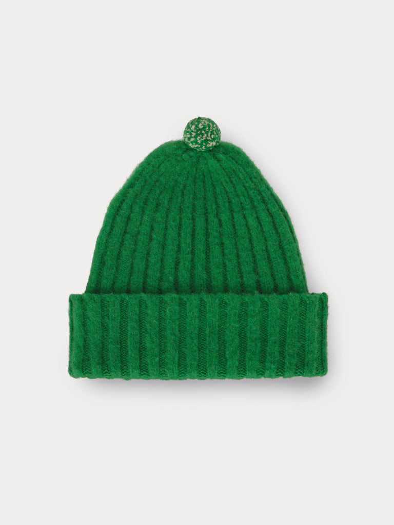 green beanie with yellow and green speckled pompom
