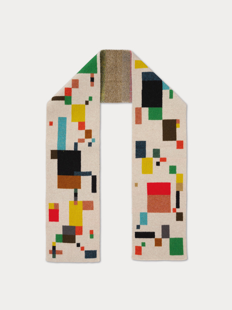 cream scarf with a pattern of colourful rectangles
