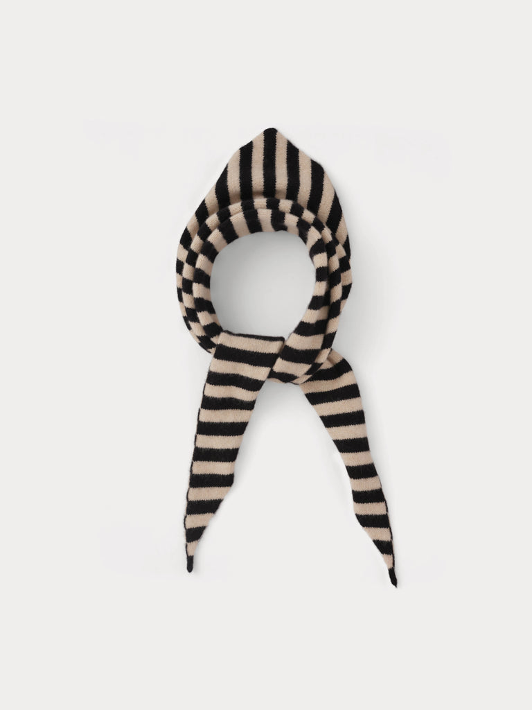 black and cream striped triangle scarf tied in a knot